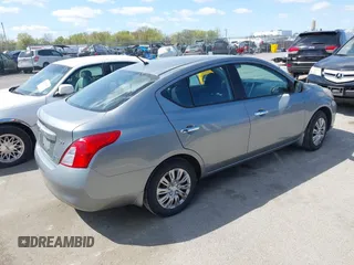 2012 Nissan Versa SL with VIN 3N1CN7AP7CL921404, listed as a IAAI auction lot 42044819 with 126,942 mi miles. Bid and sale history available at carsss.com. Image 4.