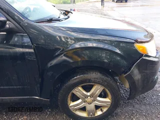 2009 Subaru Forester X with VIN JF2SH63619H738409, listed as a IAAI auction lot 42428672 with 190,636 mi miles and . Bid and sale history available at DreamBid. Image 6.