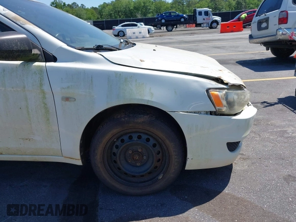 2009 Mitsubishi Lancer DE with VIN JA3AU16U29U040688, listed as a IAAI auction lot 42116109 with 202,015 mi miles. Bid and sale history available at carsss.com. Image 12.