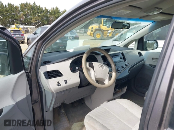 2012 Toyota Sienna with VIN 5TDKA3DC9CS011298, listed as a IAAI auction lot 41843980 with 158,787 mi miles and . Bid and sale history available at DreamBid. Image 5.