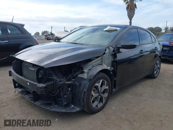 2019 Kia Forte LXS with VIN 3KPF24AD0KE109792, listed as a IAAI auction lot 42242300 with 57,680 mi miles and . Bid and sale history available at DreamBid. Image 2.