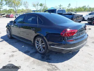 2018 Volkswagen Passat 2.0T S with VIN 1VWAA7A33JC009677, listed as a IAAI auction lot 41796723 with 63,151 mi miles. Bid and sale history available at carsss.com. Image 3.
