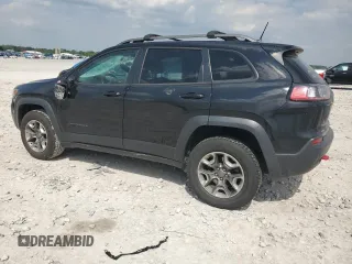 2019 Jeep Cherokee Trailhawk z VIN 1C4PJMBX2KD328612, wystawiony jako Copart lot #56859655 z przebiegiem 137 765 mil mil oraz Czysty tytuł • Clean title. Historia ofert i sprzedaży dostępna na DreamBid. Obrazek 2.