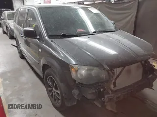 2014 Dodge Grand Caravan SE with VIN 2C4RDGBG6ER411026, listed as a IAAI auction lot 42019542 with 121,894 mi miles and . Bid and sale history available at DreamBid. Image 1.