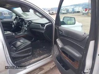 2019 Chevrolet Tahoe LT with VIN 1GNSKBKC7KR175468, listed as a IAAI auction lot 41680274 with 159,155 mi miles and . Bid and sale history available at DreamBid. Image 5.