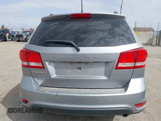 2019 Dodge Journey SE z VIN 3C4PDCBB5KT861358, wystawiony jako IAAI lot #41947841 z przebiegiem 82 099 mil mil oraz . Historia ofert i sprzedaży dostępna na DreamBid. Obrazek 16.