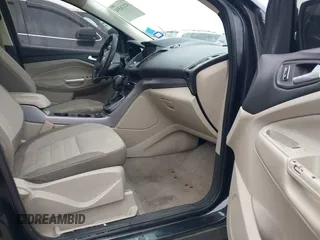 2013 Ford Escape SE with VIN 1FMCU0GX5DUB68604, listed as a IAAI auction lot 42126594 with 165,540 mi miles and . Bid and sale history available at carsss.com. Image 5.