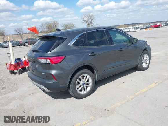 2020 Ford Escape SE with VIN 1FMCU9G66LUA77223, listed as a IAAI auction lot 42040652 with 85,589 mi miles and . Bid and sale history available at DreamBid. Image 4.