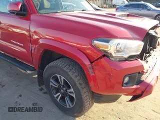 2018 Toyota Tacoma SR with VIN 3TMCZ5ANXJM154305, listed as a IAAI auction lot 41557497 with 182,624 mi miles and . Bid and sale history available at DreamBid. Image 18.