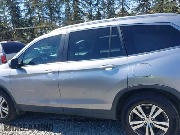 2016 Honda Pilot EX with VIN 5FNYF6H35GB001112, listed as a IAAI auction lot 42040410 with 206,424 mi miles. Bid and sale history available at carsss.com. Image 14.
