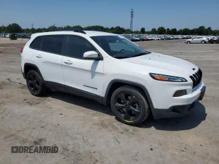 2016 Jeep Cherokee Altitude with VIN 1C4PJLCB8GW207480, listed as a Copart auction lot 62026585 with 124,229 mi miles and Salvage title. Bid and sale history available at DreamBid. Image 4.