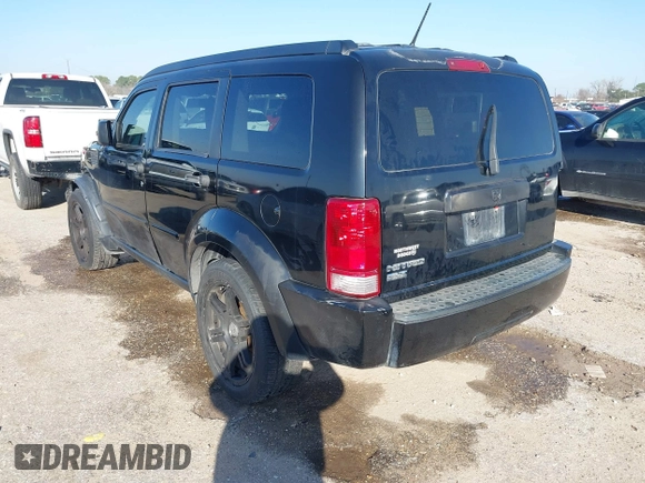 2007 Dodge Nitro SLT with VIN 1D8GT58K97W666680, listed as a IAAI auction lot 41573904 with 171,795 mi miles. Bid and sale history available at carsss.com. Image 3.