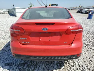 2015 Ford Focus SE with VIN 1FADP3F24FL335685, listed as a Copart auction lot 51337935 with 104,451 mi miles and Salvage Title. Bid and sale history available at DreamBid. Image 6.