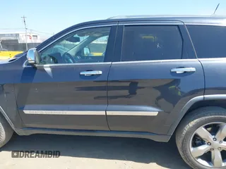 2013 Jeep Grand Cherokee Overland with VIN 1C4RJECT8DC534021, listed as a IAAI auction lot 42058374 with 137,289 mi miles. Bid and sale history available at carsss.com. Image 14.