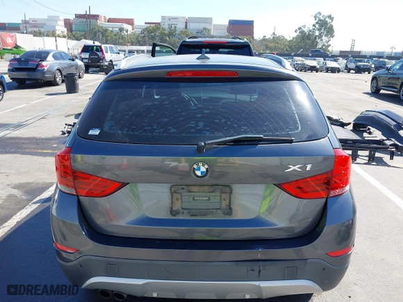 2014 BMW X1 xDrive28i with VIN WBAVL1C57EVY23722, listed as a IAAI auction lot 41839543 with 121,742 mi miles. Bid and sale history available at carsss.com. Image 17.