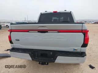 2023 Ford F-150 Lightning Pro z VIN 1FTVW1EL7PWG19070, wystawiony jako IAAI lot #41536193 z przebiegiem 22 654 mil mil oraz . Historia ofert i sprzedaży dostępna na DreamBid. Obrazek 17.