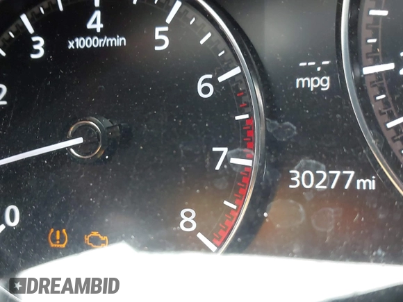 2022 Mazda CX-30 S Carbon Edition with VIN 3MVDMBCL6NM410330, listed as a IAAI auction lot 42107426 with 30,277 mi miles and . Bid and sale history available at DreamBid. Image 16.
