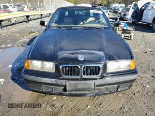 1999 BMW 3 Series 323ic with VIN WBABJ7333XEA18932, listed as a Copart auction lot 84466504 with 135,310 mi miles and Clean Title. Bid and sale history available at carsss.com. Image 5.