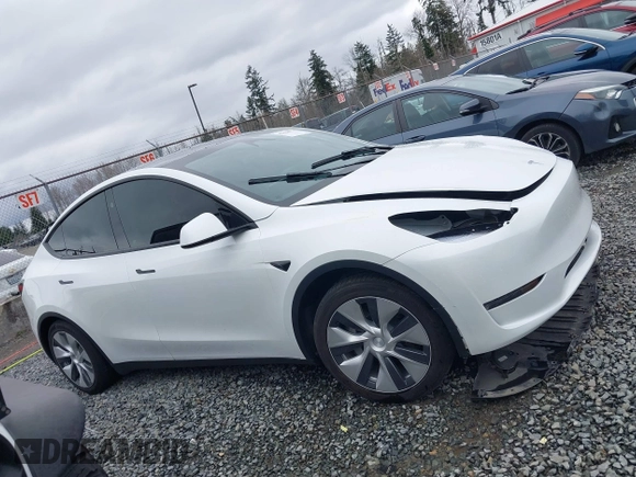 2023 Tesla Model Y Long Range with VIN 7SAYGDEE7PF809164, listed as a IAAI auction lot 41828974 with 31,772 mi miles. Bid and sale history available at carsss.com. Image 13.