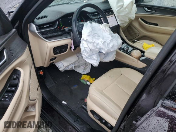 2022 Jeep Grand Cherokee with VIN 1C4RJYB61N8757034, listed as a Copart auction lot 42817095 with 23,396 mi miles and Salvage title. Bid and sale history available at DreamBid. Image 8.