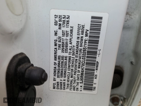 2012 Honda CR-V EX-L z VIN 5J6RM4H7XCL033265, wystawiony jako Copart lot #58824415 z przebiegiem 151 650 mil mil oraz Szkoda całkowita • Salvage title. Historia ofert i sprzedaży dostępna na DreamBid. Obrazek 13.