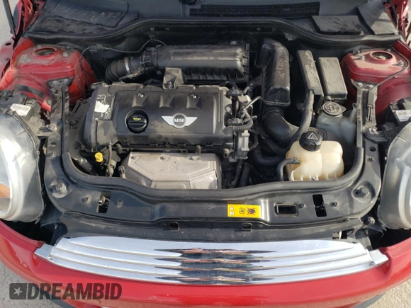 2011 MINI Hardtop with VIN WMWSU3C56BT251464, listed as a Copart auction lot 46182075 with 112,235 mi miles and Salvage Title. Bid and sale history available at DreamBid. Image 11.