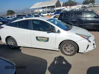 2016 Toyota Prius Two with VIN JTDKBRFUXG3001716, listed as a IAAI auction lot 42009763 with 177,132 mi miles and . Bid and sale history available at carsss.com. Image 13.