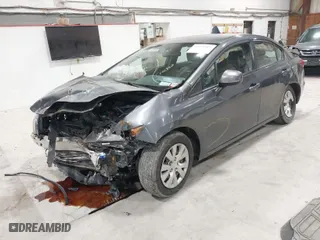 2012 Honda Civic Sdn LX with VIN 2HGFB2F57CH311381, listed as a IAAI auction lot 41850402 with 159,996 mi miles. Bid and sale history available at carsss.com. Image 2.