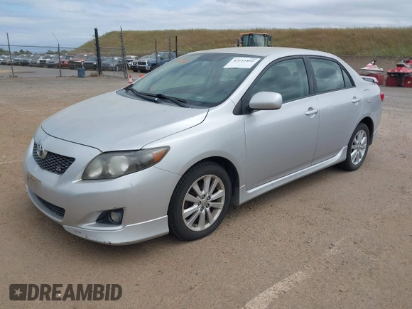 2009 Toyota Corolla with VIN 1NXBU40EX9Z028809, listed as a IAAI auction lot 42111892 with 156,182 mi miles. Bid and sale history available at carsss.com. Image 2.