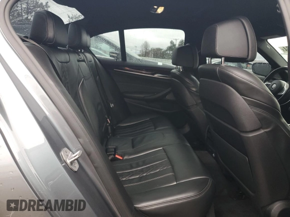 2018 BMW 5 Series M550i xDrive with VIN WBAJB9C54JB286707, listed as a Copart auction lot 49158435 with 74,307 mi miles and Salvage title. Bid and sale history available at DreamBid. Image 11.