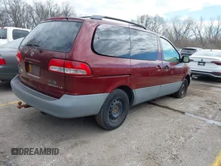 2001 Toyota Sienna LE with VIN 4T3ZF13C71U345315, listed as a IAAI auction lot 41887275 with 253,432 mi miles. Bid and sale history available at carsss.com. Image 4.