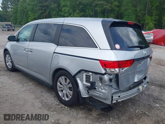 2015 Honda Odyssey EX-L with VIN 5FNRL5H68FB044259, listed as a IAAI auction lot 42127227 with 143,902 mi miles and . Bid and sale history available at DreamBid. Image 3.