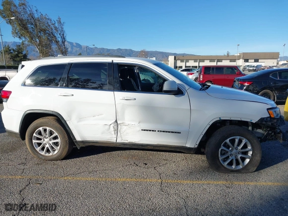 2021 Jeep Grand Cherokee Laredo X with VIN 1C4RJEAG2MC719395, listed as a IAAI auction lot 41338484 with 99,636 mi miles. Bid and sale history available at carsss.com. Image 13.