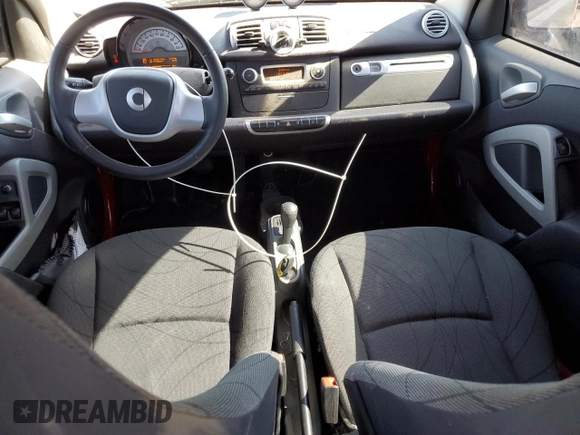 2014 Smart fortwo Passion z VIN WMEEJ9AA6EK792201, wystawiony jako Copart lot #74756574 z przebiegiem 17 282 mil mil oraz Szkody całkowita. Historia ofert i sprzedaży dostępna na DreamBid. Obrazek 8.