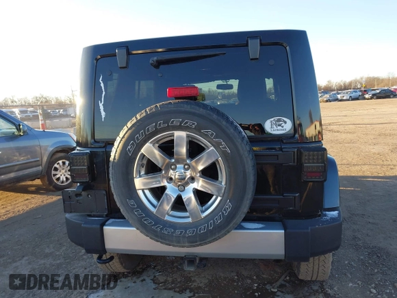 2014 Jeep Wrangler Unlimited Sahara with VIN 1C4BJWEG7EL322316, listed as a IAAI auction lot 41059508 with 144,662 mi miles. Bid and sale history available at carsss.com. Image 16.
