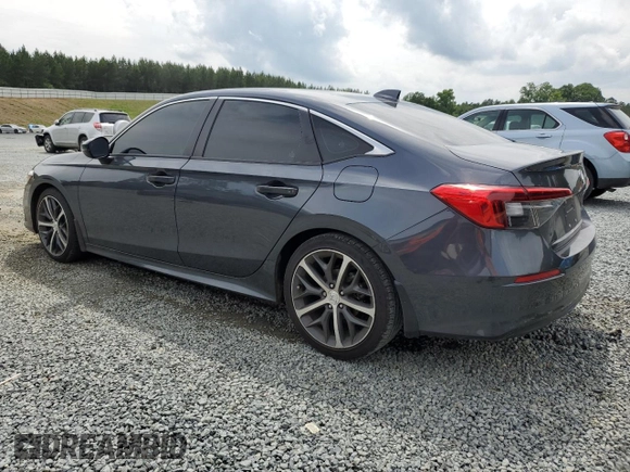 2024 Honda Civic Touring z VIN 2HGFE1F96RH324748, wystawiony jako Copart lot #58833725 z przebiegiem Nie podano mil oraz Szkoda całkowita • Salvage title. Historia ofert i sprzedaży dostępna na DreamBid. Obrazek 2.