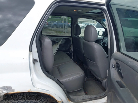 2003 Ford Escape XLT Popular 2 with VIN 1FMYU93193KC06499, listed as a IAAI auction lot 42192640 with 180,095 mi miles and . Bid and sale history available at DreamBid. Image 8.