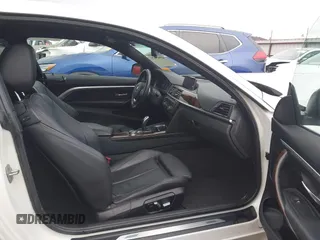 2016 BMW 4 Series 428i with VIN WBA3N7C54GK227475, listed as a IAAI auction lot 40963425 with 87,408 mi miles and . Bid and sale history available at carsss.com. Image 5.