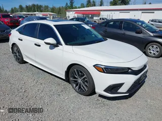 2024 Honda Civic Touring z VIN 2HGFE1F98RH339977, wystawiony jako IAAI lot #42359372 z przebiegiem 6 085 mil mil oraz . Historia ofert i sprzedaży dostępna na DreamBid. Obrazek 1.