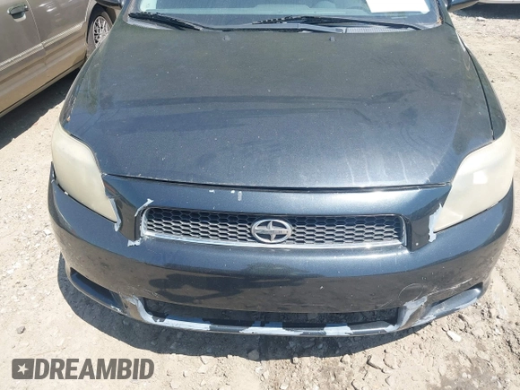 2005 Scion tC with VIN JTKDE177750026736, listed as a IAAI auction lot 42075370 with 246,192 mi miles. Bid and sale history available at carsss.com. Image 6.