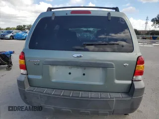 2005 Ford Escape XLT with VIN 1FMYU03135KE33198, listed as a Copart auction lot 75321764 with 169,733 mi miles and Salvage Title. Bid and sale history available at carsss.com. Image 6.
