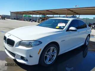 2014 BMW 5 Series 528i with VIN WBA5A5C50ED503130, listed as a IAAI auction lot 41819922 with 135,923 mi miles. Bid and sale history available at carsss.com. Image 20.
