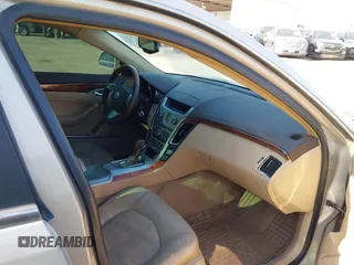 2009 Cadillac CTS RWD w/1SA with VIN 1G6DF577990141214, listed as a IAAI auction lot 42014205 with 237,986 mi miles. Bid and sale history available at carsss.com. Image 5.