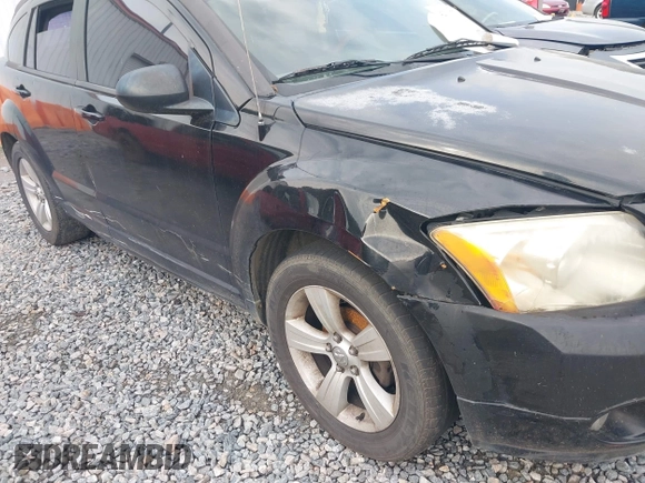 2011 Dodge Caliber Mainstreet z VIN 1B3CB3HAXBD113487, wystawiony jako IAAI lot #42300778 z przebiegiem 139 014 mil mil oraz . Historia ofert i sprzedaży dostępna na DreamBid. Obrazek 6.