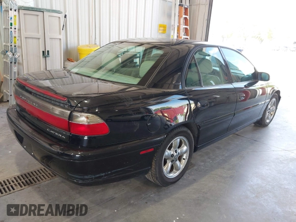1997 Cadillac Catera z VIN W06VR54R9VR162389, wystawiony jako IAAI lot #40142990 z przebiegiem 111 558 mil mil oraz . Historia ofert i sprzedaży dostępna na DreamBid. Obrazek 4.