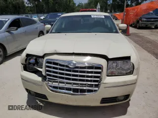 2009 Chrysler 300 Touring z VIN 2C3KA53V09H594340, wystawiony jako Copart lot #57789525 z przebiegiem 166 216 mil mil oraz Szkoda całkowita • Salvage title. Historia ofert i sprzedaży dostępna na DreamBid. Obrazek 5.