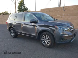 2021 Honda Pilot EX-L with VIN 5FNYF5H54MB018846, listed as a IAAI auction lot 41208987 with 80,757 mi miles. Bid and sale history available at carsss.com. Image 1.