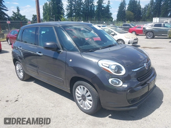 2014 FIAT 500L Easy with VIN ZFBCFABH0EZ028102, listed as a IAAI auction lot 42721149 with 115,137 mi miles and . Bid and sale history available at DreamBid. Image 1.