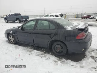 2004 Pontiac Grand Am GT with VIN 1G2NW52E14C173335, listed as a Copart auction lot 85103774 with 140,203 mi miles and Salvage Title. Bid and sale history available at carsss.com. Image 2.