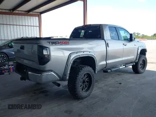 2015 Toyota Tundra Limited with VIN 5TFBW5F14FX424723, listed as a IAAI auction lot 42129929 with 222,060 mi miles and . Bid and sale history available at DreamBid. Image 4.